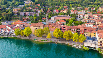 Fototapeta na wymiar Aerial view from the drone of the landscape of a small town on the shores of lake Como, Italy.