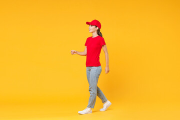 Full length body delivery employee woman in red cap blank t-shirt uniform work courier in service...