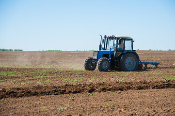 Obraz premium Agriculture with a tractor