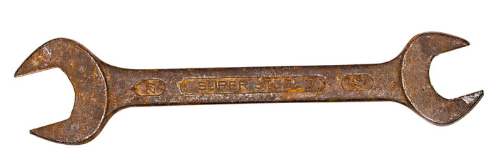 Old wrench on a white background