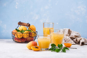 Apricot juice in glass. Healthy drink