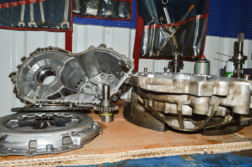 Spare parts from the gearbox are on the table