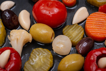 Mediterranean marinated veggie medley with olives preserved in natural sea salt brine.