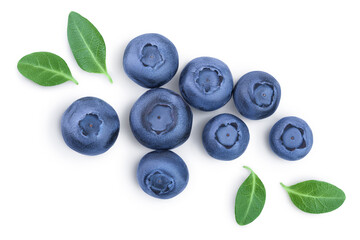 fresh ripe blueberry with leaves isolated on white background with clipping path . Top view. Flat lay pattern