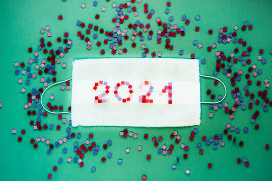 Year 2021 sign on medical mask.