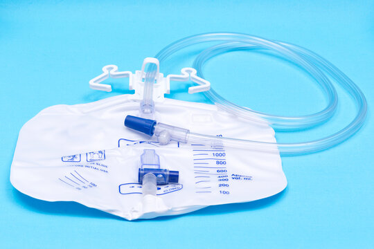 Sterile Urinary Drainage Bag with Anti-Reflux Tower isolated on blue background.