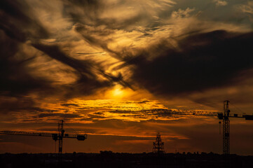 Industrial panorama - cranes on sunset © Damian
