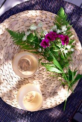 Relaxing afternoon in gorgeous backyard garden setting during stay at home summer vacation in secluded privacy to enjoy a refreshing glass of wine