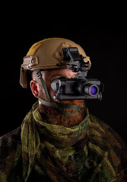 Night vision device attached to the helmet. A special device for observing in the dark. Equipment for the military, police and special forces