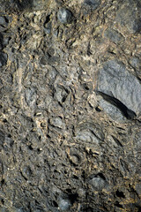 Colorful rock texture. Natural cracks void.