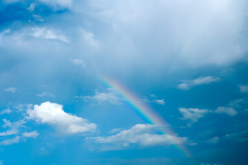 Fototapeta na wymiar Rainbow in the sky in rainy season in Chiangmai , Thailand