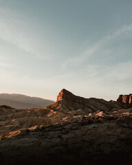 red rock desert peak at sunset