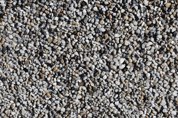 Gravel texture. Small rocks pattern. Little stones background.