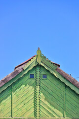 Beautiful wooden decoration on the traditional fronton house in Danube Delta region