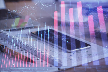 Double exposure of forex chart drawing and cell phone background. Concept of financial data analysis