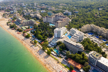 Golden Sands, Bulgaria - July 22, 2019: aerial image a drone. Resort on Black Sea coast. Many hotels and beaches with tourists, sunbeds and umbrellas. Travel and vacation concept.
