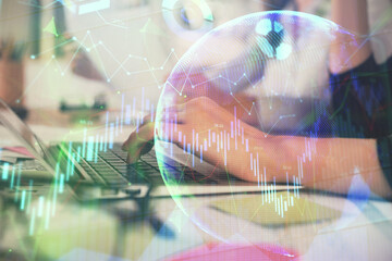 Multi exposure of woman hands typing on computer and financial graph hologram drawing. Stock market analysis concept.