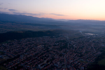 Aerial view from the drone. Stunning mountain and countryside view shot from a drone in the morning at dawn. Beautiful landscape of sunrise in the mountains