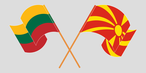 Crossed and waving flags of North Macedonia and Lithuania