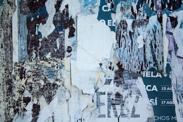 Background of old and torn posters, crumpled paper, texture and backgrounds.	