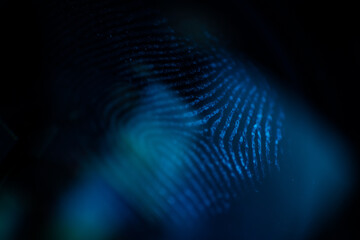 Macro close up of human fingerprint on glass surface