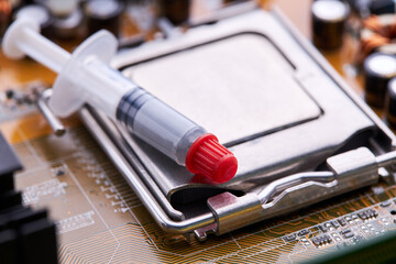 thermally conductive paste close up. computer hardware maintenance service concept. adjusting...