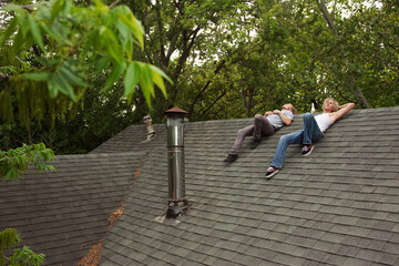 Friends hanging out on roof together