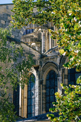 View of the exterior facade of the Basilica of Saint-Remi, a medieval abbey church in Reims, a historical monument in the Grand Est region of France  
