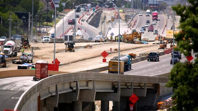 Traffic passing highway construction site, Dallas, Texas, United States