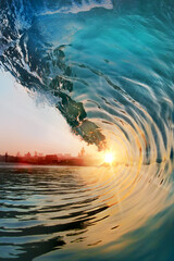 Beautiful ocean surfing shorebreak wave at sunset time - obrazy, fototapety, plakaty