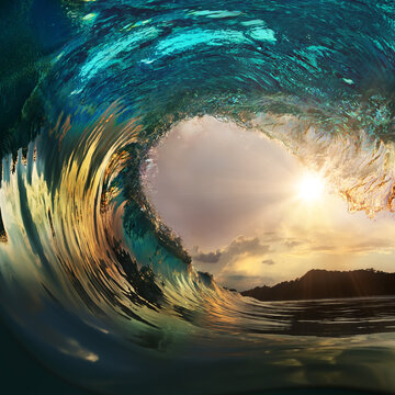 Beautiful ocean surfing wave at sunset beach