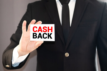 Cash Back, message on the card show by businesswoman