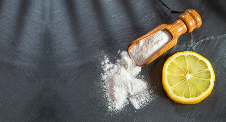 lemon wedge and baking soda powder - Citrus x limon
