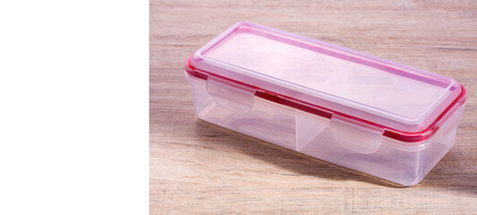 Clear plastic container with airtight seal for food preservation