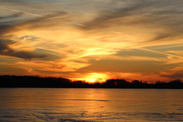 Sunset over a Frozen Lake