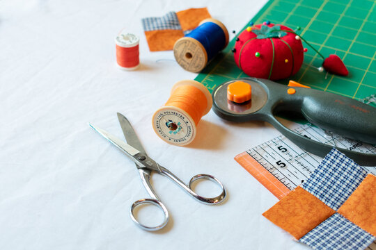 orange and blue quilting supplies
