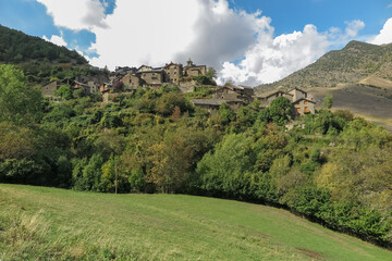 Fototapeta na wymiar View of the small village of Arestui, with houses made of stone, located in the Alt Pirineu Natural Park, province of Lérida, autonomous community of Catalonia