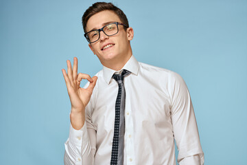 Business man white shirt tie glasses self-confidence official blue background