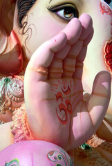 Close-up view of Indian Hindu God Ganesha idol , in blessing pose
