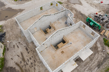 Aerial inspection photo of a building under construction two story townhouse