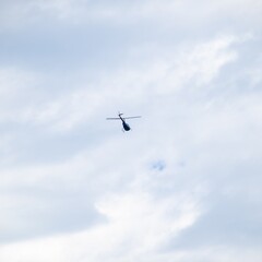 Helicopter flying high over Sydney harbour Australia