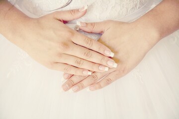 hands of bride and groom