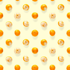 Fresh mandarine Seamles pattern. Ripe fruit tangerines seamless pattern. Fresh citrus isolated on yellow background pattern. Flat lay of Clementine.