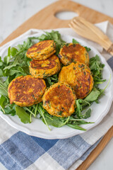 Homemade fried sweet potato cakes on a plate 