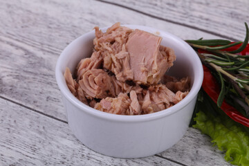 Tasty canned tuna fish in the bowl