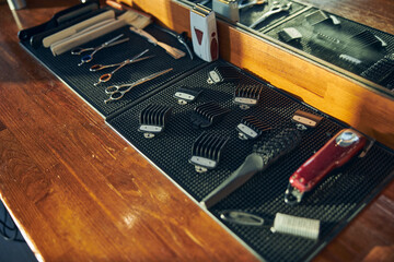 Various of hair-grooming tools on a barber table