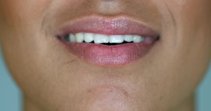 Young black woman macro close-up mouth smiling