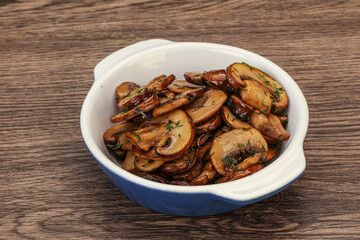Roasted champignon with herbs and spices