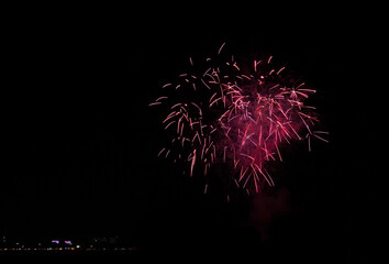 Colorful fireworks of various colors over night sky