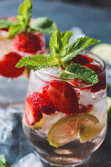 Glass of fresh strawberry mojito, closeup